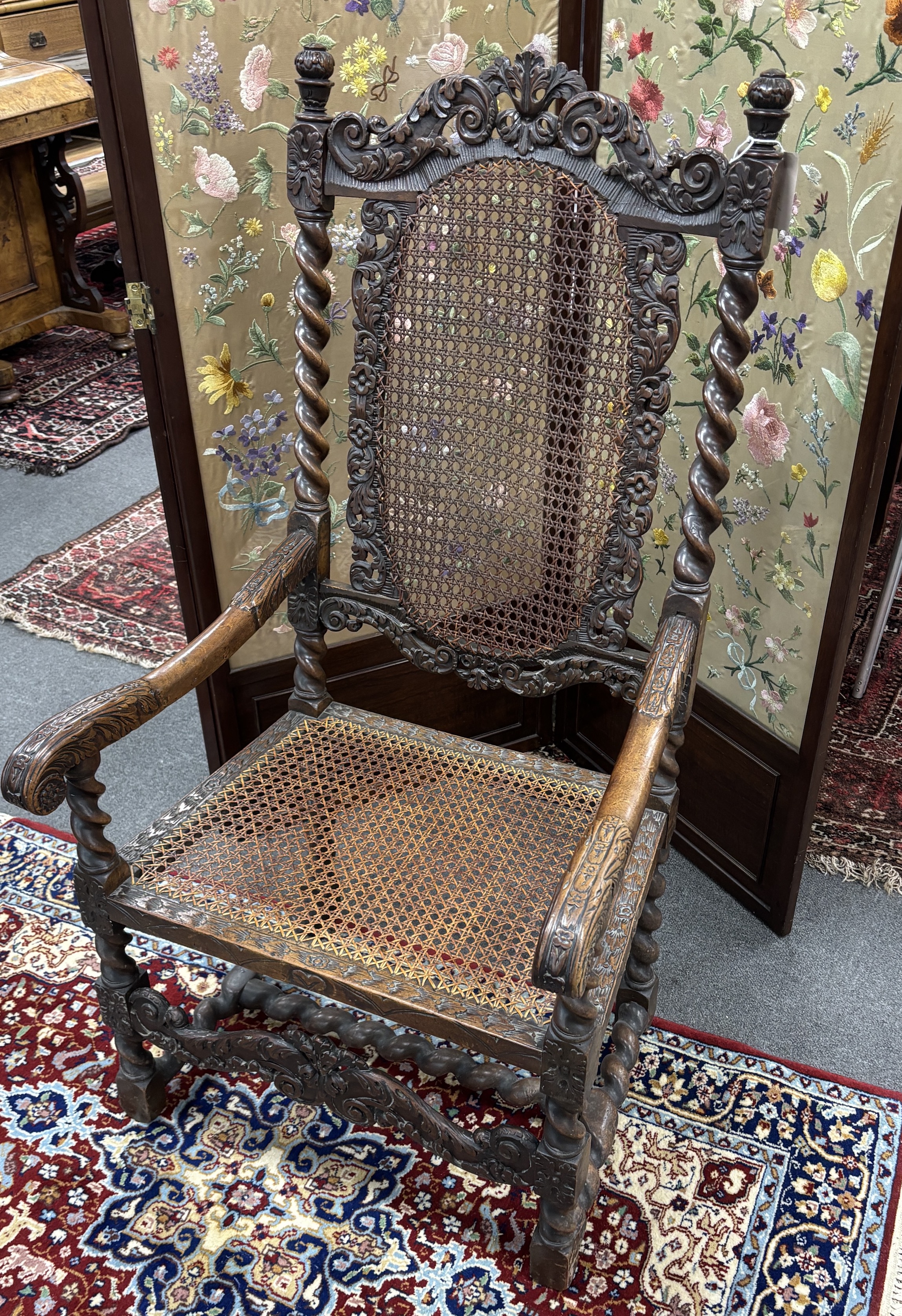 A Charles II period Carolean style caned walnut elbow chair, width 62cm, depth 50cm, height 117cm
